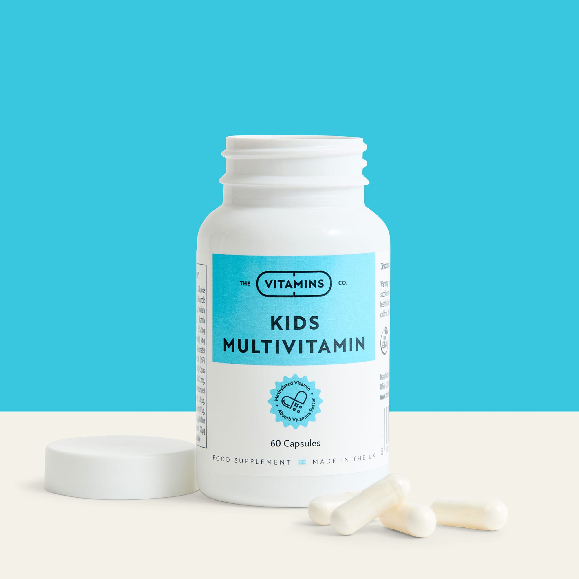 Front label of The Vitamins Co Kids Multivitamin – complete daily supplement for children in white plastic bottle